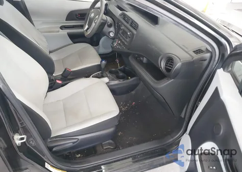 2012 Toyota Prius C One from USA, damaged, VIN JTDKDTB32C1014552